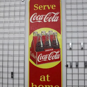Vintage metal and porcelain Coca-Cola sign marked Made in Canada 1951, 53 1/4" H X 17 1/4"