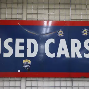 Vintage metal and porcelain sign "USED CARS" 65" top length X 54" bottom length X 30" H