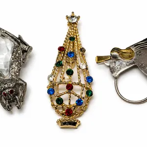 Collection of Three Brooches: Spider, Christmas Tree, and Angel