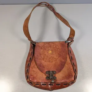 Vintage Embossed Leather Shoulder Bag with Floral Motif