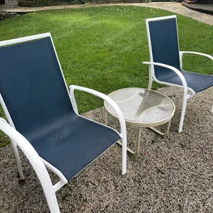 Outdoor sling chairs with table