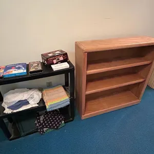 Bookshelves: Black Two-Tier Shelf and Solid Wood