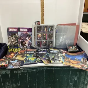 BOX W/  X-O MANOWAR GRAPHIC NOVELS, GUNDAM WAR CARD GAME, BINDER W/ MOVIE TRADING CARDS, ZELDA UNO