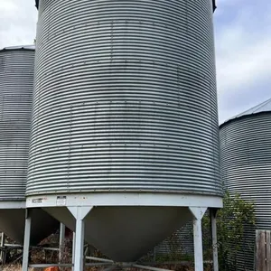 1950 bushel Westeel Rosco bin on Westeel hopper cone on skid, Bin #13