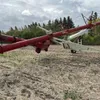 13” x 70’,  buhler/Farm King 1370 pto swing hopper auger