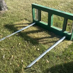 Skid steer mount 2 prong bale fork. Seller CAN NOT load