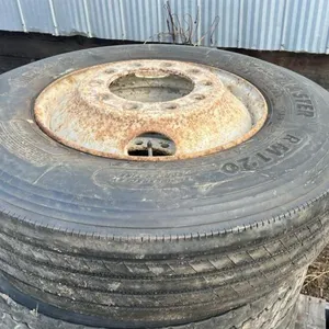(4) 11R22.5 tires on rims, (D)