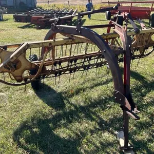 NH 56 side delivery rake w/ rubber mount teeth,  S/N 69646