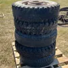 Used 7.50-16LT truck tire on rim
