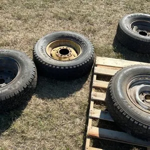(4) Used truck tires on rims