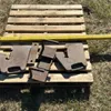 Pallet w/ (2) suitcase weights, weight holder, yellow piece of tube steel