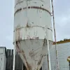 Approx 20’ H x 8’ D Friesen hopper bottom feed bin on legs w/ 4” pencil auger (No motor)