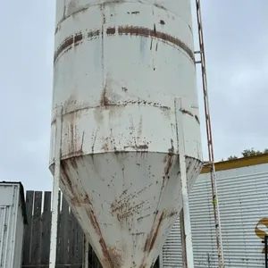 Approx 20’ H x 8’ D Friesen hopper bottom feed bin on legs w/ 4” pencil auger (No motor)