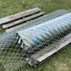 56” x 12” culvert/cribbing + piece of chain link fence