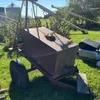 Tank on 2 wheeled wagon