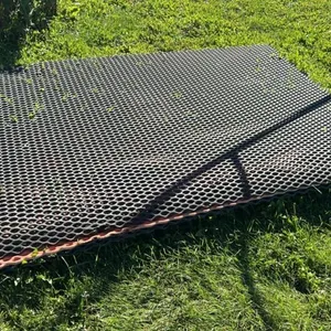 (4) 5’ x 7’ sections of rubber covered hog flooring