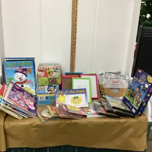 BOX W KID ITEMS - PUZZLES, DVD'S, CD'S, COLORING BOOKS, SAFETY BUMPERS