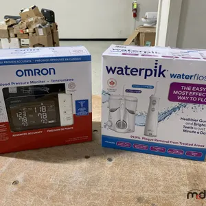Waterpik Flosser & Omron Blood Pressure Tester
 UNRESERVED