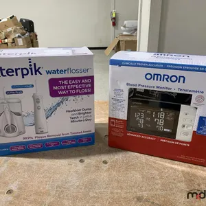Waterpik Flosser & Omron Blood Pressure Tester
 UNRESERVED