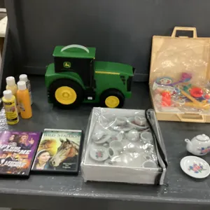 PLASTIC TRACTOR STORAGE CONTAINER, CERAMIC TEA SET, FISHER PRICE MEDICAL KIT, PAINT, DVDS
