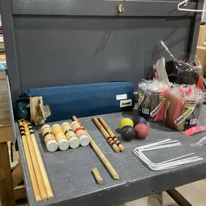 2 BOXES WITH MANY SHOE HORNS, AND CAR SEAT ANGLE ADJUSTER + CROQUET SET