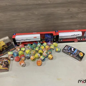 Misc. Peterbilt Trucks, CAT Dump Truck, Mini Simpsons Figurines
 UNRESERVED