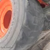 Skid steer tires and wheels