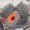 Skid steer tires and wheels