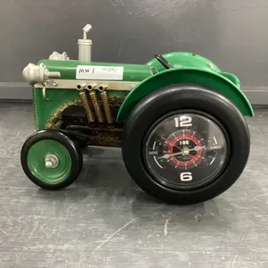 METAL TRACTOR W/  CLOCKS ON BOTH BACK WHEELS