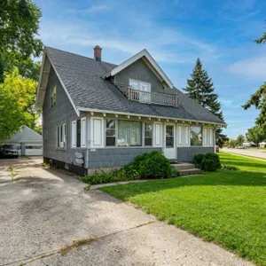 Duplex With Awesome Income Potential & Two Detached Garages 