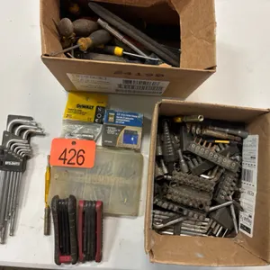 Assorted screwdriver bits and screwdrivers. Etc