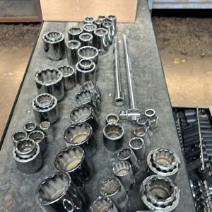 Assortment of 3/4 drive sockets, extension and bar