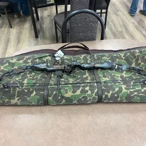 LEFT HAND MARTIN LYNX MAGNUM BOW W/ 55 LB. DRAW, TRUE GLOW SIGHT, CASE