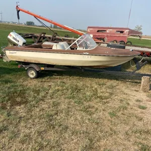 VANGUARD VIP 142 BOAT W/ 50HP JOHNSON & TRAILER