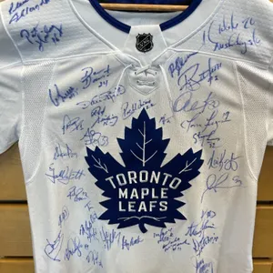 TORONTO MAPLE LEAFS JERSEY SIGNED BY 41 ALUMNI MEMBERS INCLUDING HALL OF FAMER DARRYL SITTLER