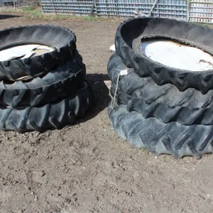 8 - TRACTOR TIRE FEEDERS