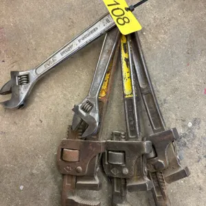 Assortment of wrenches and pipe wrenches