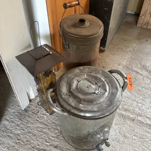 Antique canisters and bird feeder