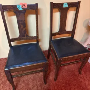 2 wooden oak chairs