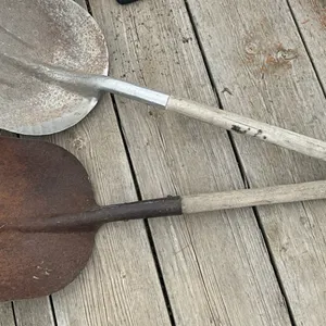 Two grain shovels