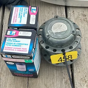 Two fuel caps and two fuel tank filters