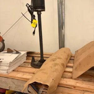 Part roll of blue skin & sump pump
