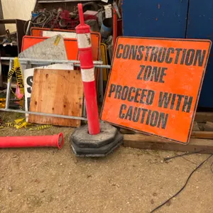 Assortment of road safety signs & traffic cones