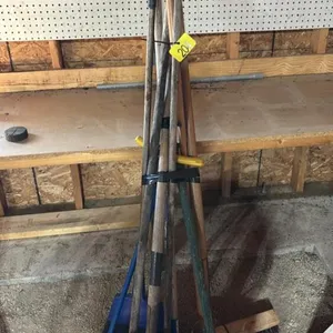 Assorted shovels and yard tools