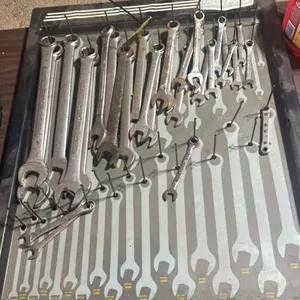 Assorted flat wrenches, organizer