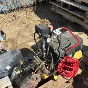 Air compressor with paint sprayers and air stapler
