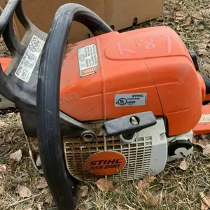 K87. Stihl MS290 chainsaw, oil and chains