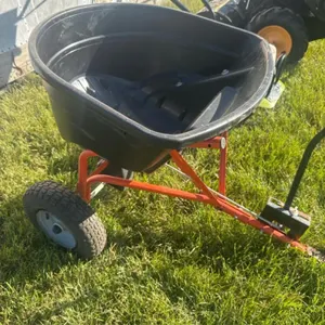 Tow behind yard spreader
