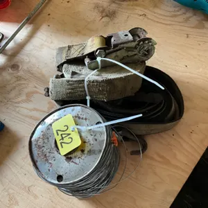 Two ratchet straps, and two rolls of wire