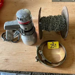 Two exhaust clamps, part roll of chain and a paint sprayer